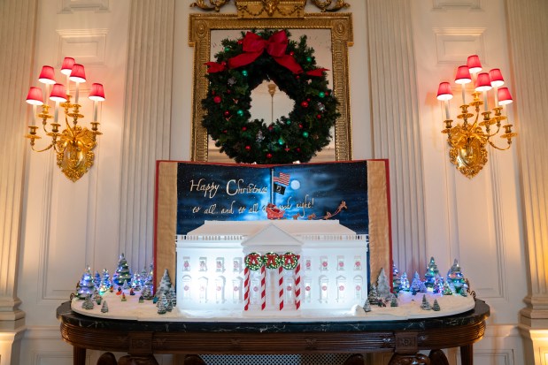 Holiday decorations adorn the State Dining Room of the White House for the 2023 theme "Magic, Wonder, and Joy," Monday, Nov. 27, 2023, in Washington. (AP Photo/Evan Vucci)