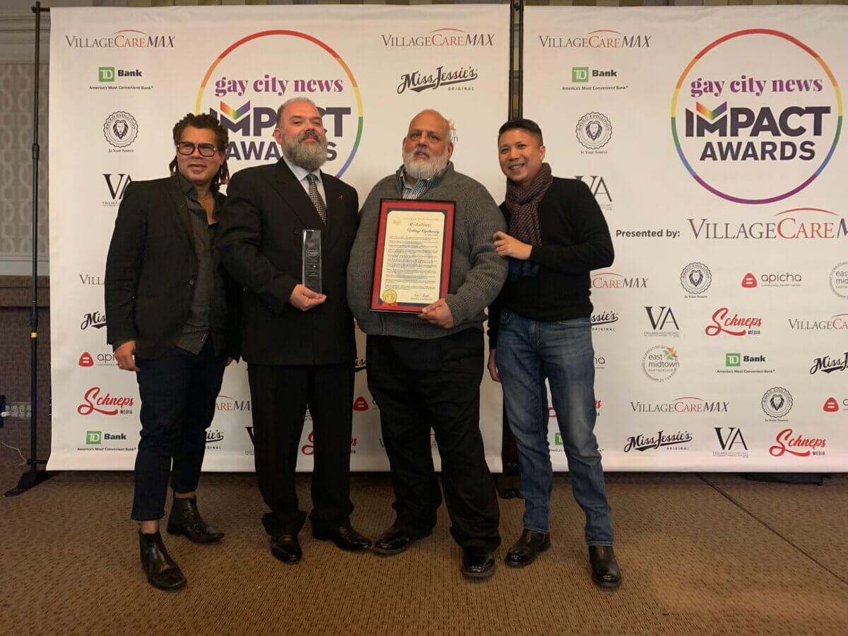 Village Apothecary's director of pharmacy services John Kaliabakos, second from the left, stands with some members of his team at the 2022 Gay City News Impact Awards.