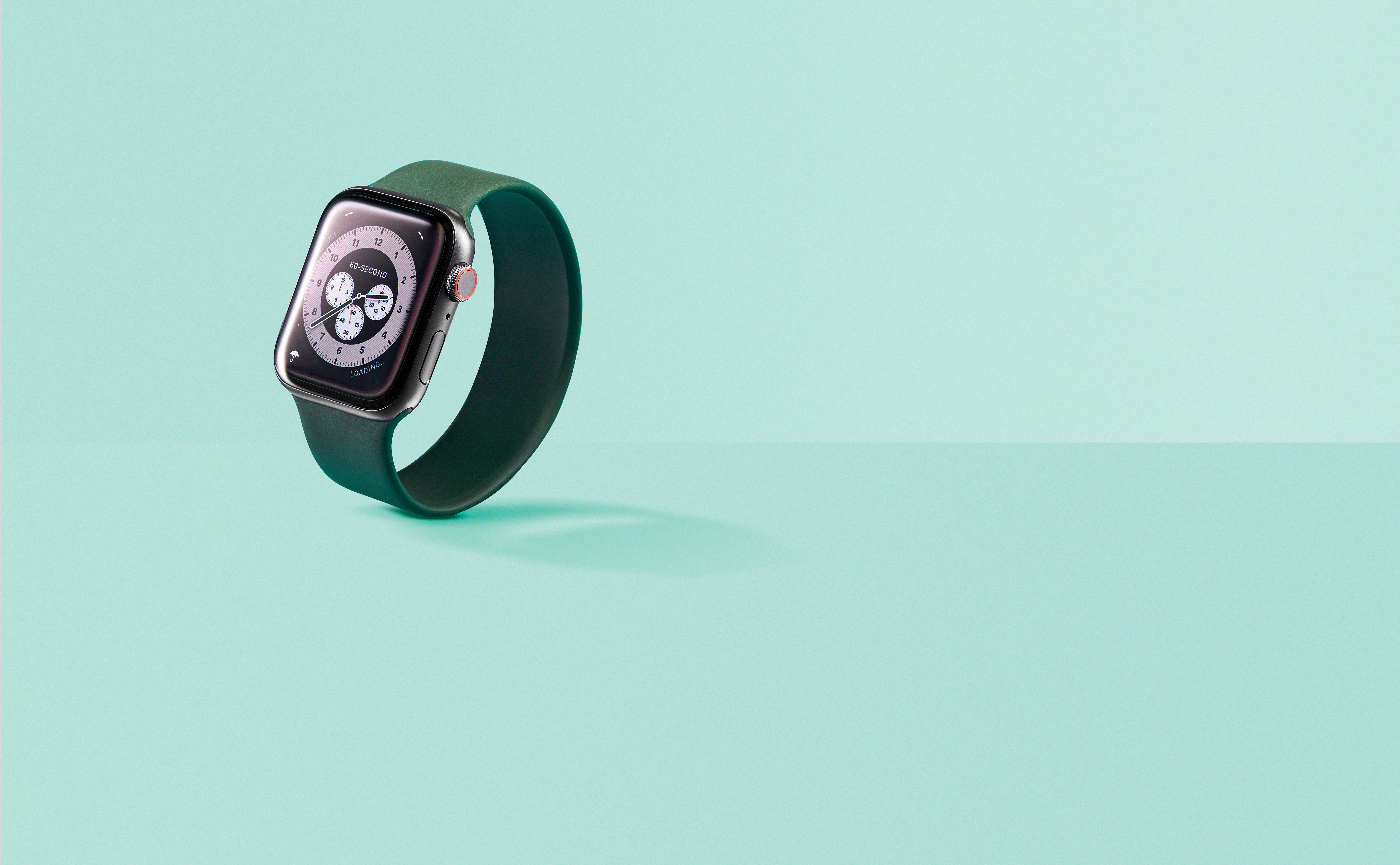 Apple watch depicted against light blue background 