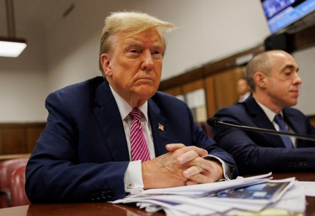 Former President Donald Trump sits at the defendant's table during his criminal trial as jury selection continues at Manhattan Criminal Court on April 19, 2024 in New York City. (Sarah Yenesel - Pool/Getty Images)