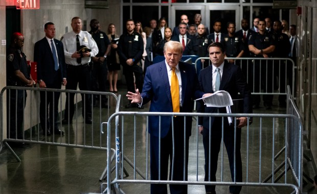 Former President Donald Trump speaks to the media at the end of the day's proceedings for his trial for allegedly covering up hush money payments linked to an extramarital affair with Stormy Daniels, at Manhattan Criminal Court on May 14, 2024 in New York City.